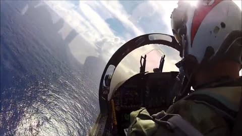 Pilot trying to land on aircraft carrier