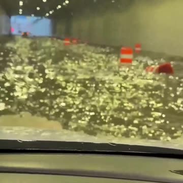 ‘DEAR GOD PLEASE’: Woman prays to “make it through”high water after severe flood