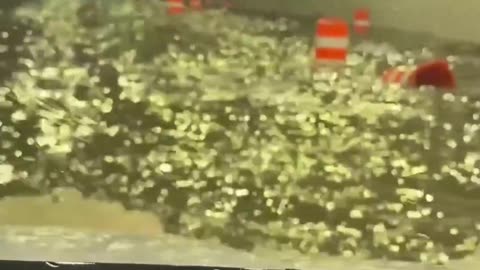 ‘DEAR GOD PLEASE’: Woman prays to “make it through”high water after severe flood