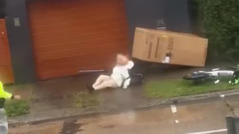 Granny Toppled By Flying Box During Cyclone