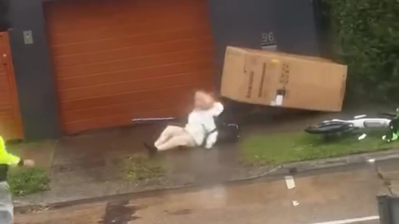 Granny Toppled By Flying Box During Cyclone