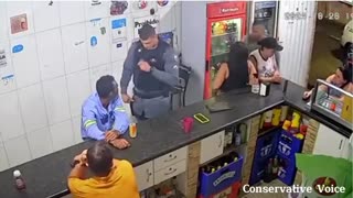 CAMERAS CAPTURE BRAZILIAN POLICE OFFICERS SETTING AN EXAMPLE.