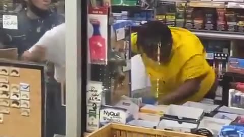 Store owners fight off a wild monkey
