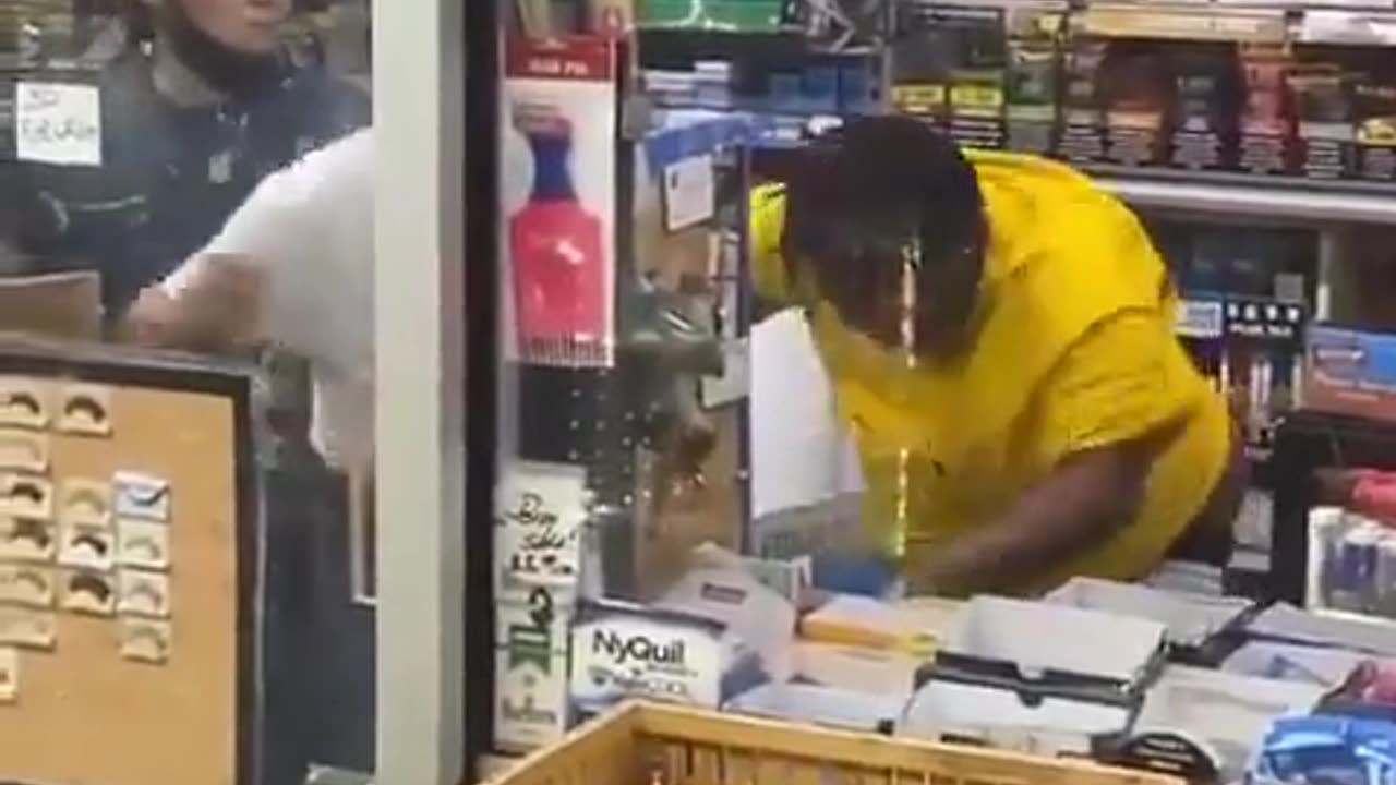 Store owners fight off a wild monkey