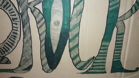 Graffiti painted inside a brown background