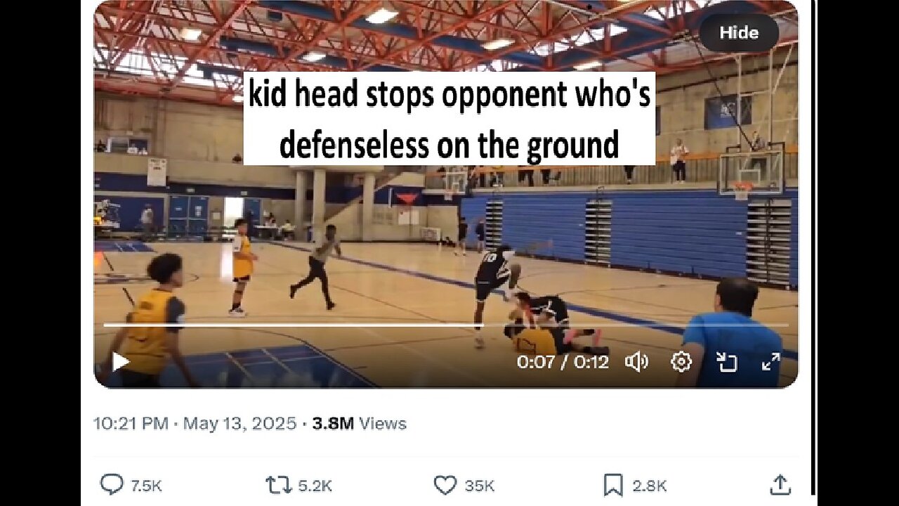 Kid head stops basketball opponent who fell down