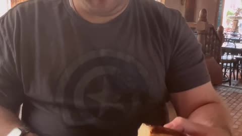Trying the Cheesy Garlic Pretzel Bread at Disneyland