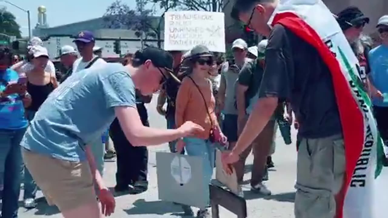 Protestors in LA set up a guillotine Cheeto scene