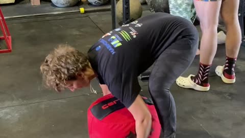 100 Pound Sandbag lift (RDL variation)