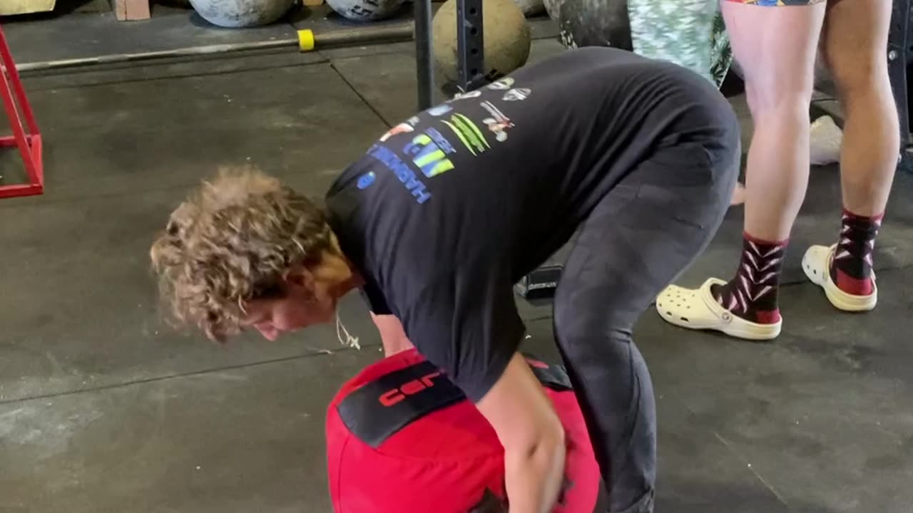 100 Pound Sandbag lift (RDL variation)