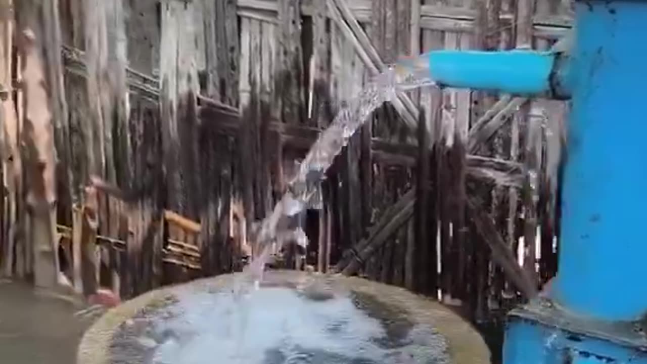 water coming up through the well and through the ground