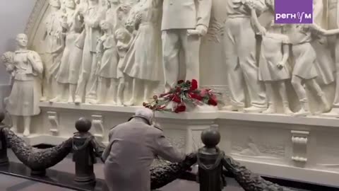 80 Year-Old Men Bring Flowers to a Stalin Monument