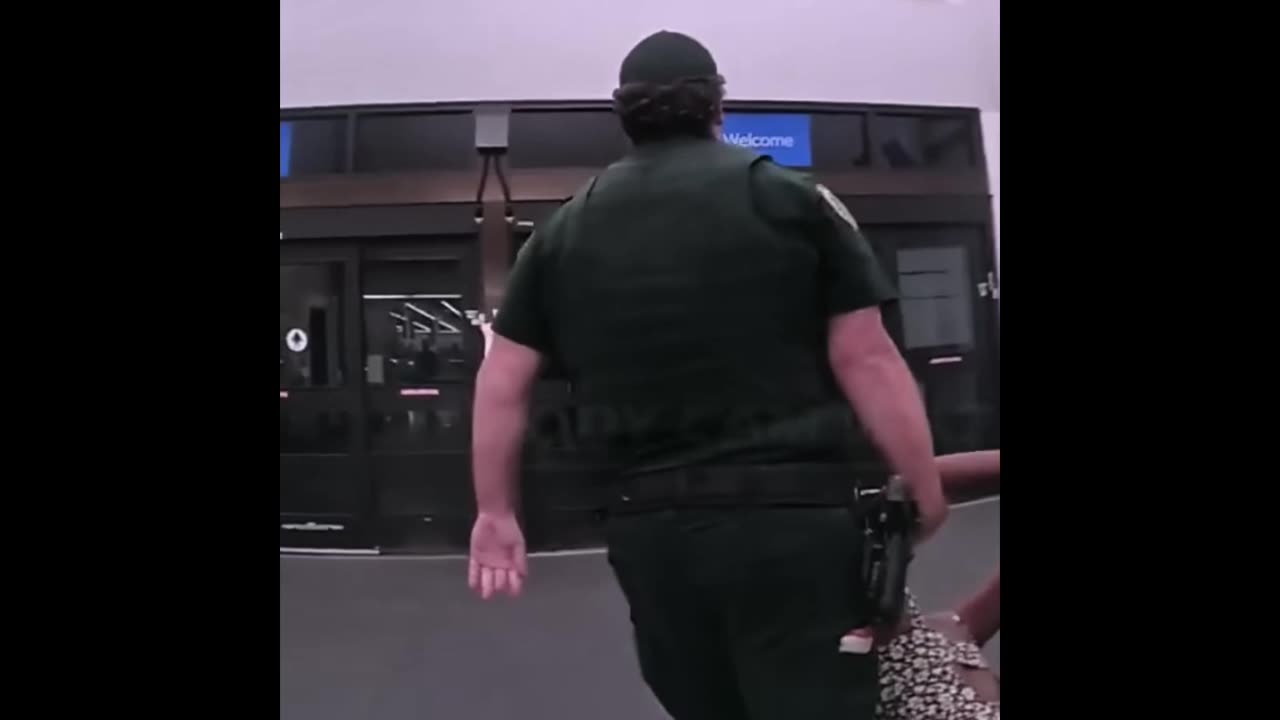 Florida Police Officers Pick Something Up at Walmart
