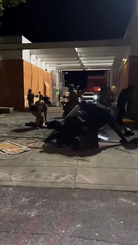 Antifa trying to block ICE agents