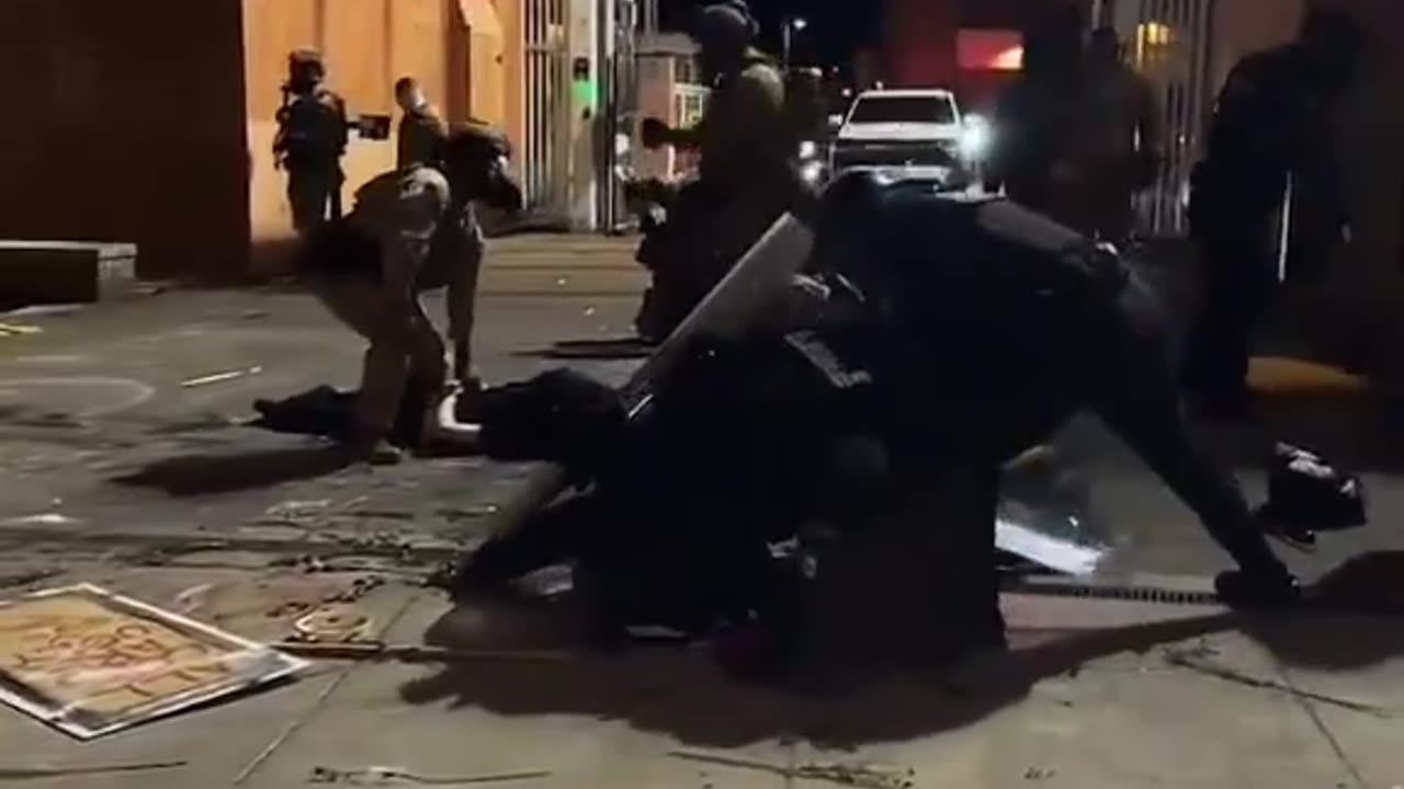 Antifa trying to block ICE agents