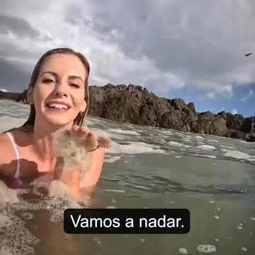 Influencer Michelle Sky goes viral after swimming in what she thought was sea foam.