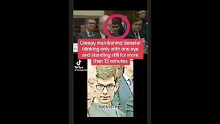 Creepy - Guy behind this Senator does not move for 15 mins. Mind control? MK Ultra?