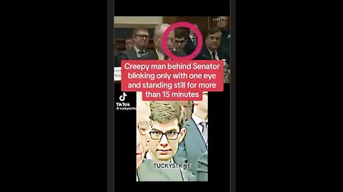 Creepy - Guy behind this Senator does not move for 15 mins. Mind control? MK Ultra?