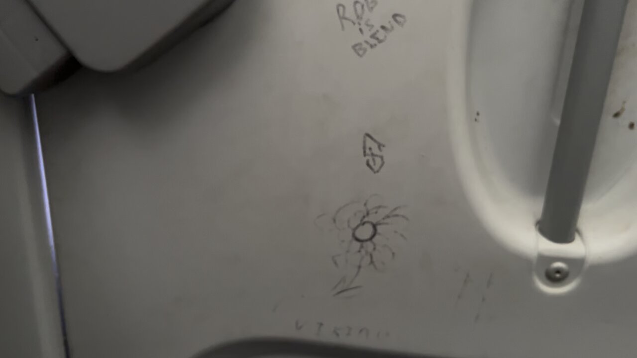 Porta-Potty In The Rain