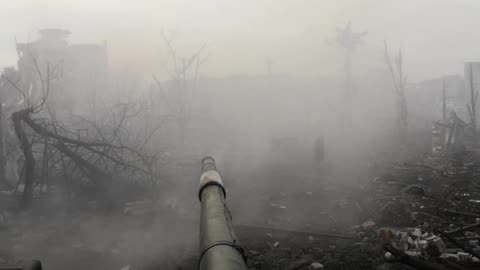 POV of Russian tank in city fighting.