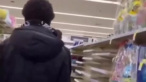 black father holding his two sons accountable after they stole energy drinks and snacks from a CVS