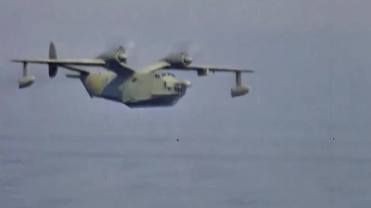 A curious Soviet Beriev Be-12 "Chayka" flies past USS Norris in June 1969