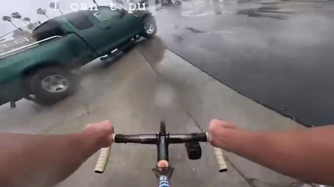 Bicyclist driving too fast to avoid hitting pickup truck. reckless driving