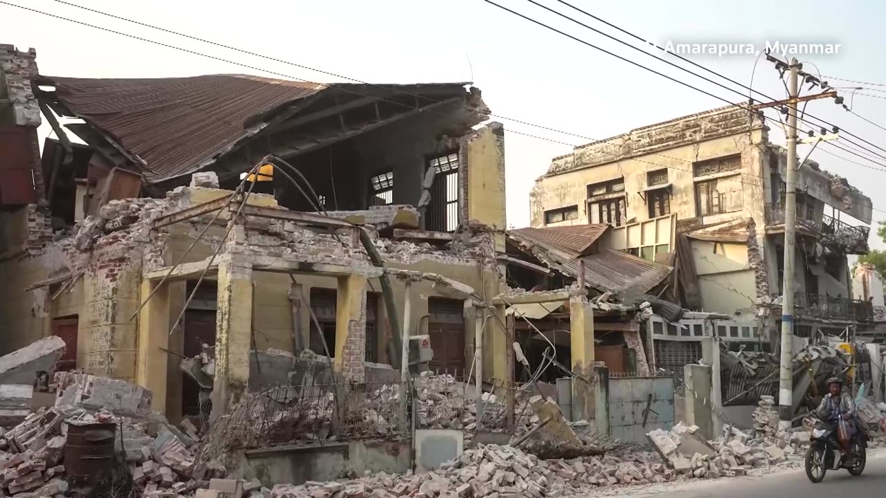 Man recounts leap across splitting skyscraper as quake hit Bangkok
