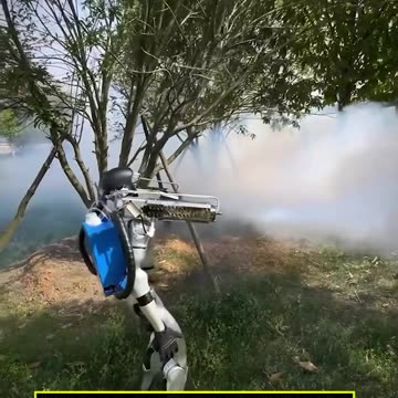 (China) - A robot sprays an entire field