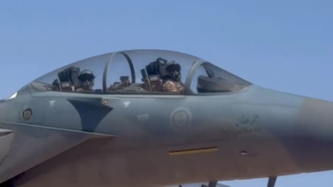 Air force one escorted by Saudi jets