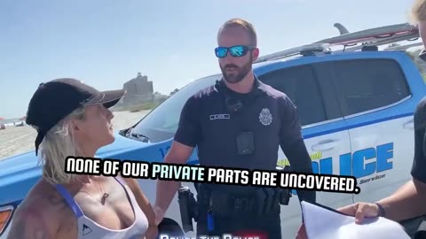 Cops handcuff and detain woman for wearing a thong.