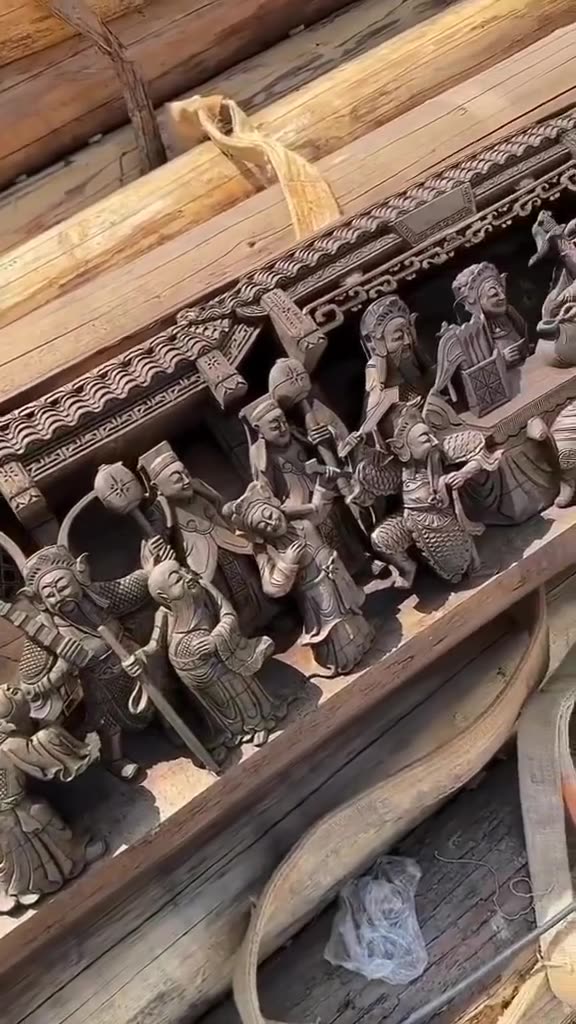 Fantastic beauty Building a wooden temple somewhere in Asia. The skill and precision of these workers is amazing!
