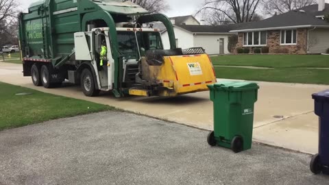 Garbage Truck Bursts Into Flames