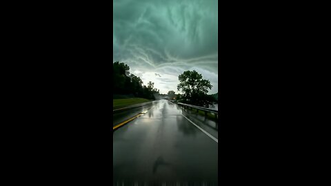 Storm Chasing Drive: Eerie Strom Sky Over Silent Bridge