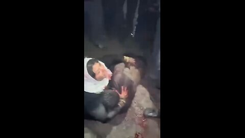 WATCH: Syrian HTS Government & Supporters Desecrate Body of Executed Former SAA Soldier