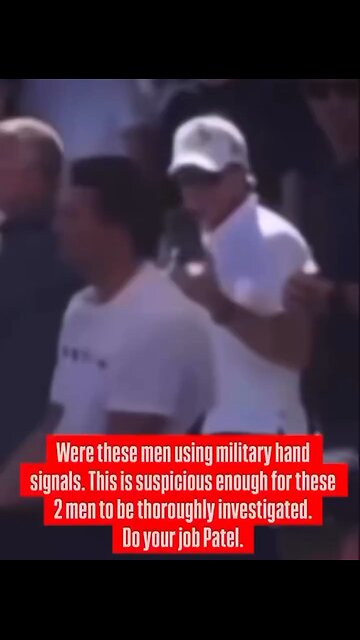 🙂 Professional hit? Footage of men making military-style hand gestures moments