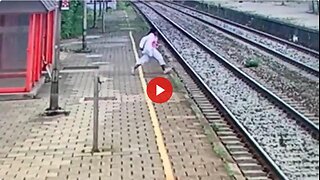 Woman tries to commit suicide. She did it wrong. You are supposed to let the train hit you...🤨🚆