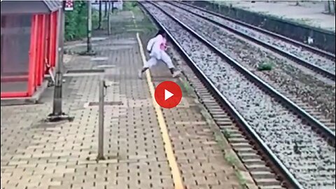 Woman tries to commit suicide. She did it wrong. You are supposed to let the train hit you...🤨🚆