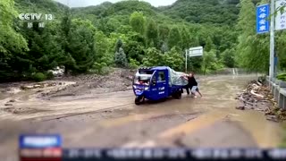 Heavy rains in China flood urban areas and farmland