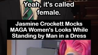 Jasmine Crockett Mocks MAGA Women's Looks While Standing by Man in a Dress