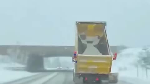 driver drives into bridge with his snow plow⧸dump truck in Barrie, Ontario. Canada