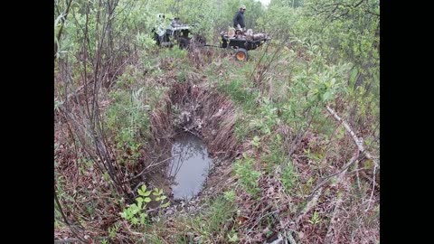 Filling borrow pits on the property