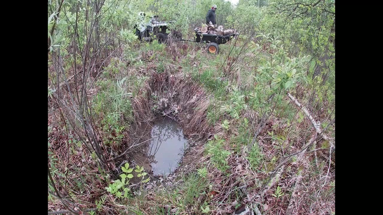 Filling borrow pits on the property