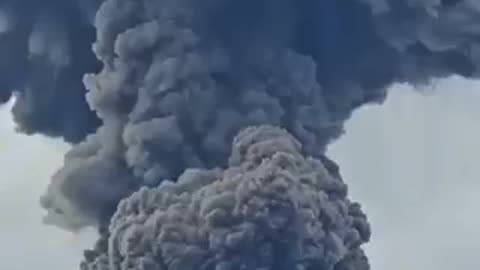 Indonesia's Mount Marapi volcano erupts, sending a towering plume of ash into the sky.