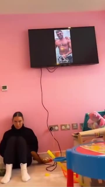 Woman caught checking out men on her phone when she accidently plugged phone into TV