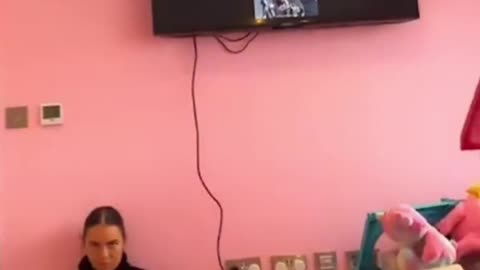 Woman caught checking out men on her phone when she accidently plugged phone into TV