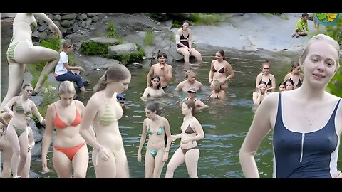 Group of tourist bathing near a lake