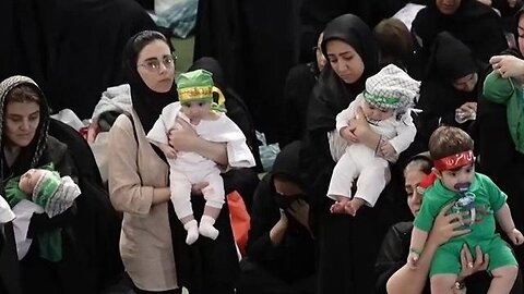 Iranian women offer up their babies as martyrs in a public ritual in Tehran