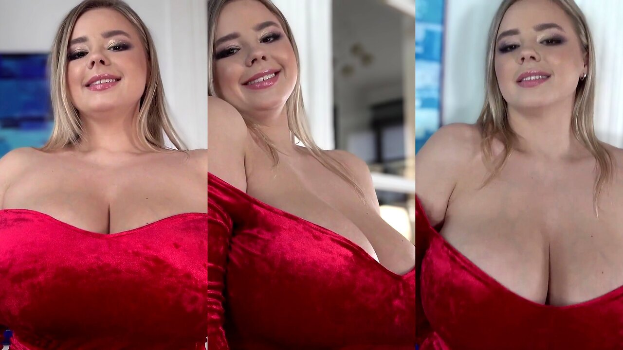 Model Vivian Blush in a splendid red cocktail dress