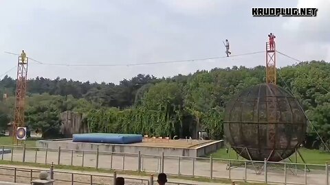 The real acrobat called in sick so they had to make due with the janitor
